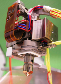 One of the delicate test mass release mechanisms